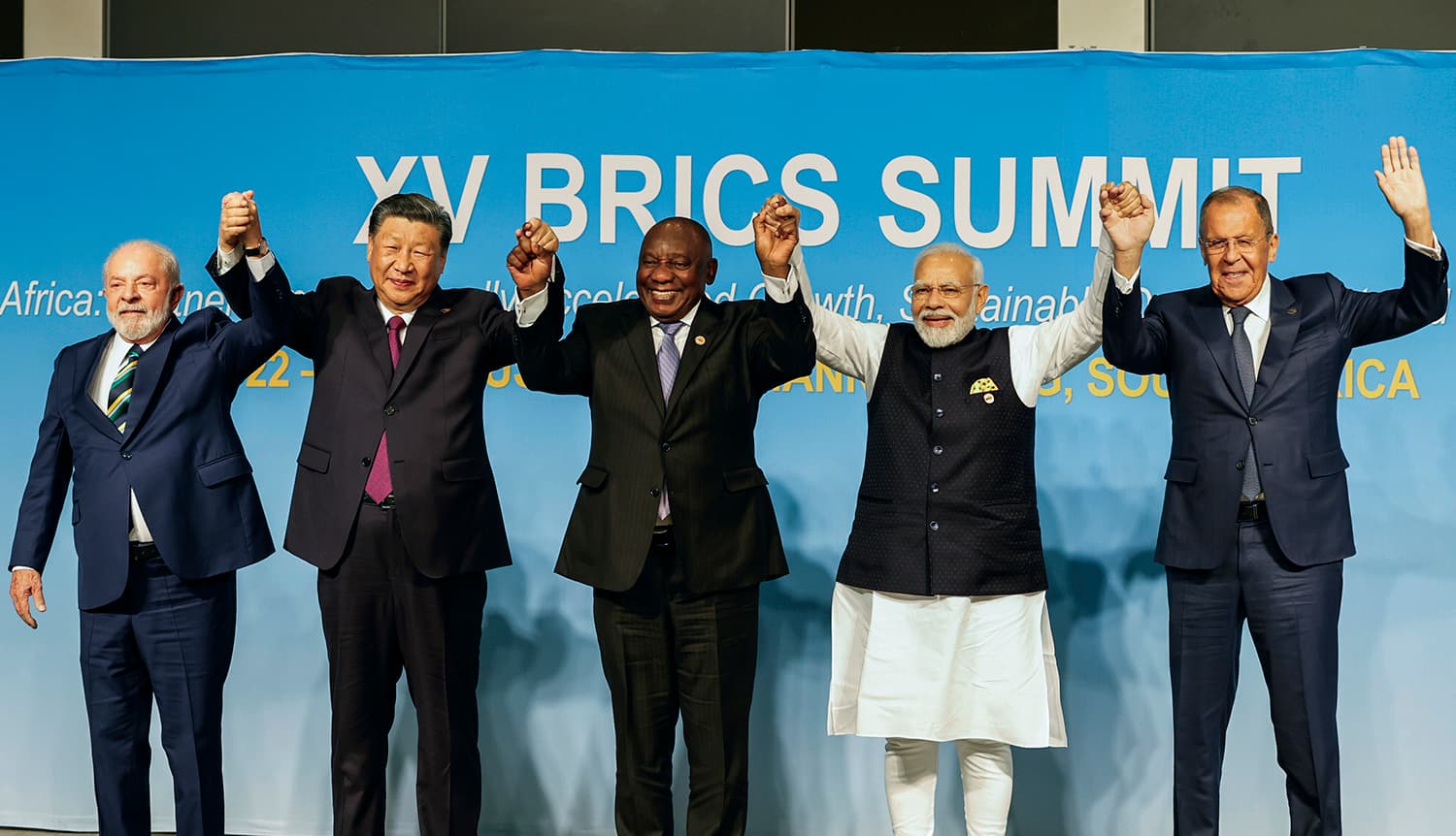 From left, Brazil's President Luiz Inacio Lula da Silva, China's President Xi Jinping, South Africa's President Cyril Ramaphosa, India's Prime Minister Narendra Modi and Russia's Foreign Minister Sergei Lavrov pose for a BRICS group photo during the 2023 BRICS Summit at the Sandton Convention Center in Johannesburg, South Africa, Wednesday, Aug. 23, 2023. (Gianluigi Guercia/Pool via AP)